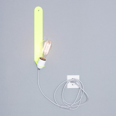 Skipper wall light in neon yellow with a silver-white fabric cable