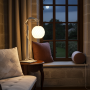 TAISEKI table lamp in white with ZUKR lampshade in the cosy castle at full moon