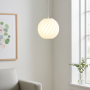Small white Zukr pendant lamp above sofa corner