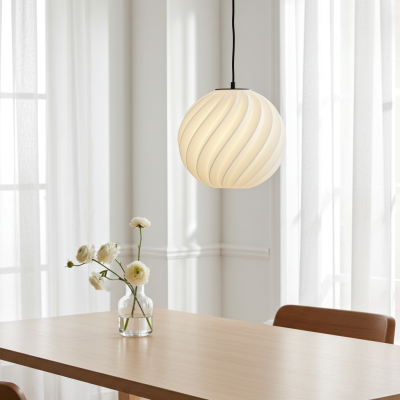 A Zukr lampshade, 30 cm in diameter, hanging above a dining table made of oiled oak with a vase of flowers