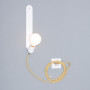 The flexible wall light in white and yellow, featuring a Scandinavian design